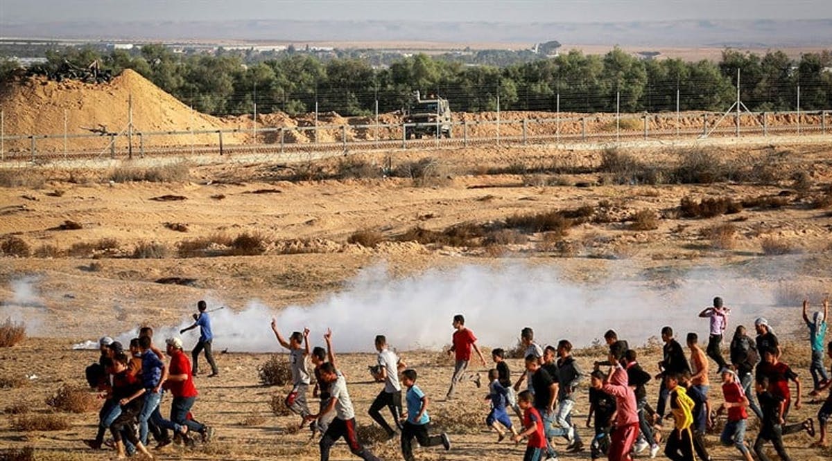 Hamas terrorists protest along the Gaza border