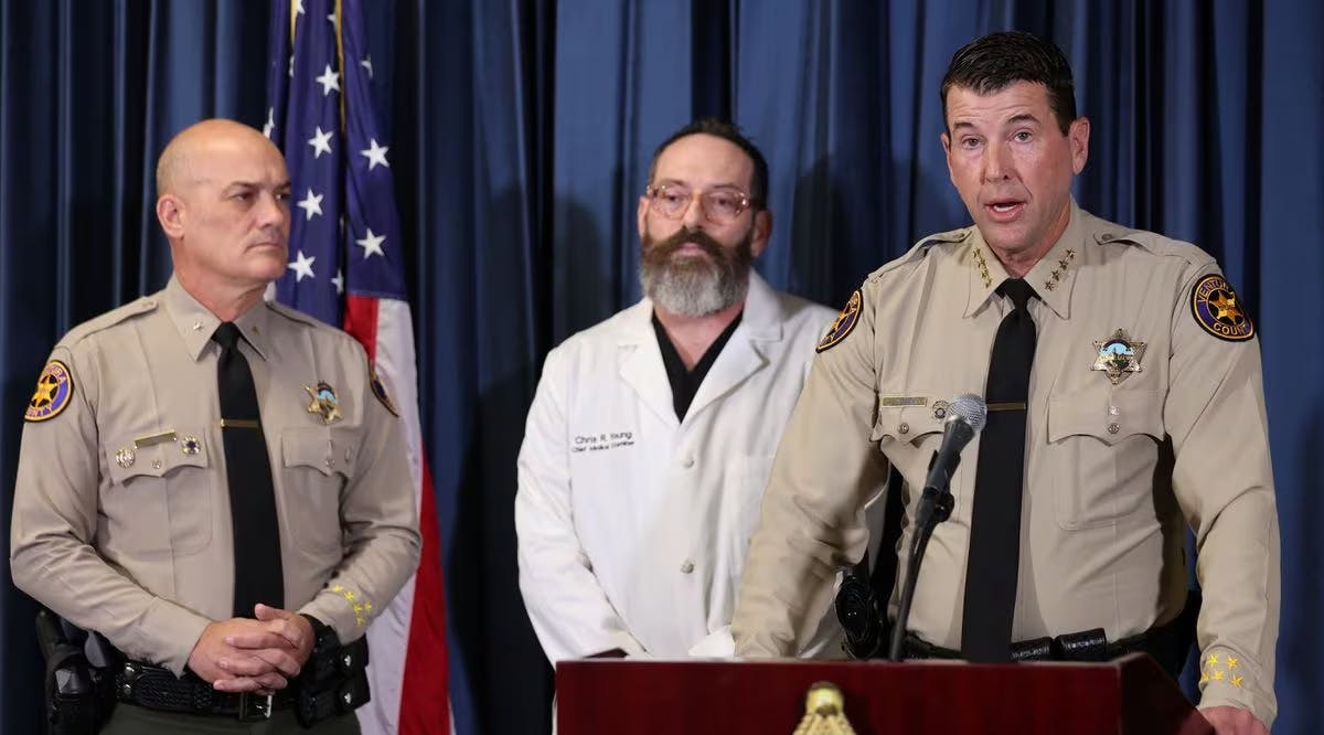 Ventura County Sheriff Jim Fryhoff speaks next to Ventura County Chief Medical Examiner Chris R. Young and Police Chief for the City of Thousand Oaks Commander Jeremy Paris