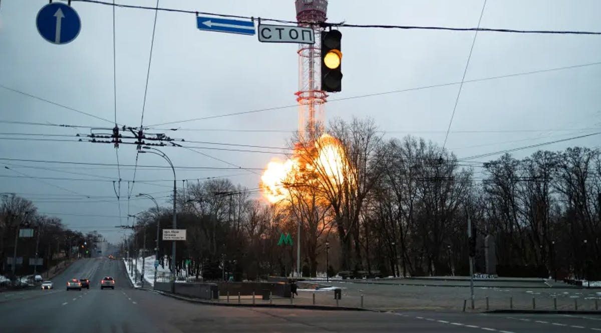 A blast is seen near a TV tower adjacent to the Babyn Yar Holocaust Memorial