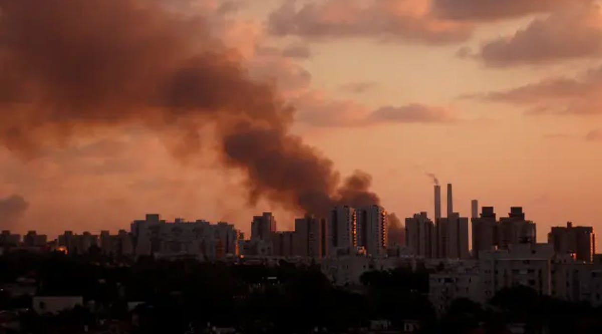 Smoke is seen behind Ashkelon near Israel's border with the Gaza Strip, in southern Israel
