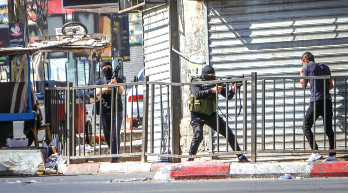 PALESTINIAN GUNMEN on the streets of Jenin