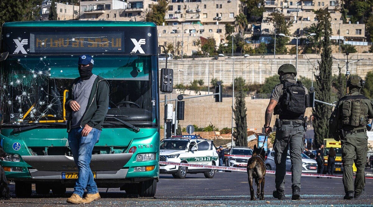Police and security personnel at the scene of a terror attack in Jerusalem