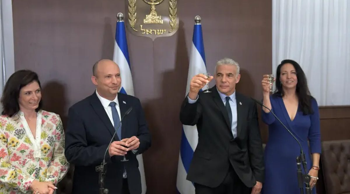 Bennett, Lapid and their families participated in a small ceremony for Lapid's transition to prime minister