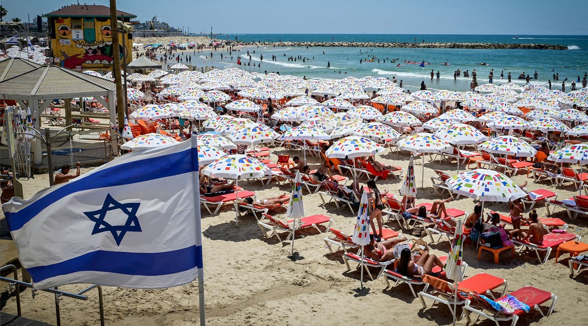 Israelis enjoy the beach in Tel Aviv