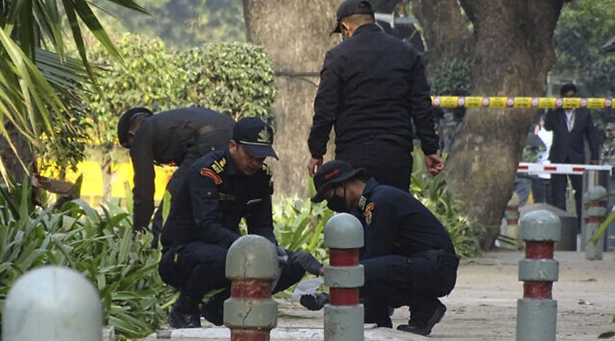 National Security Guard soldiers inspect the site of a blast near the Israeli Embassy in New Delhi, India