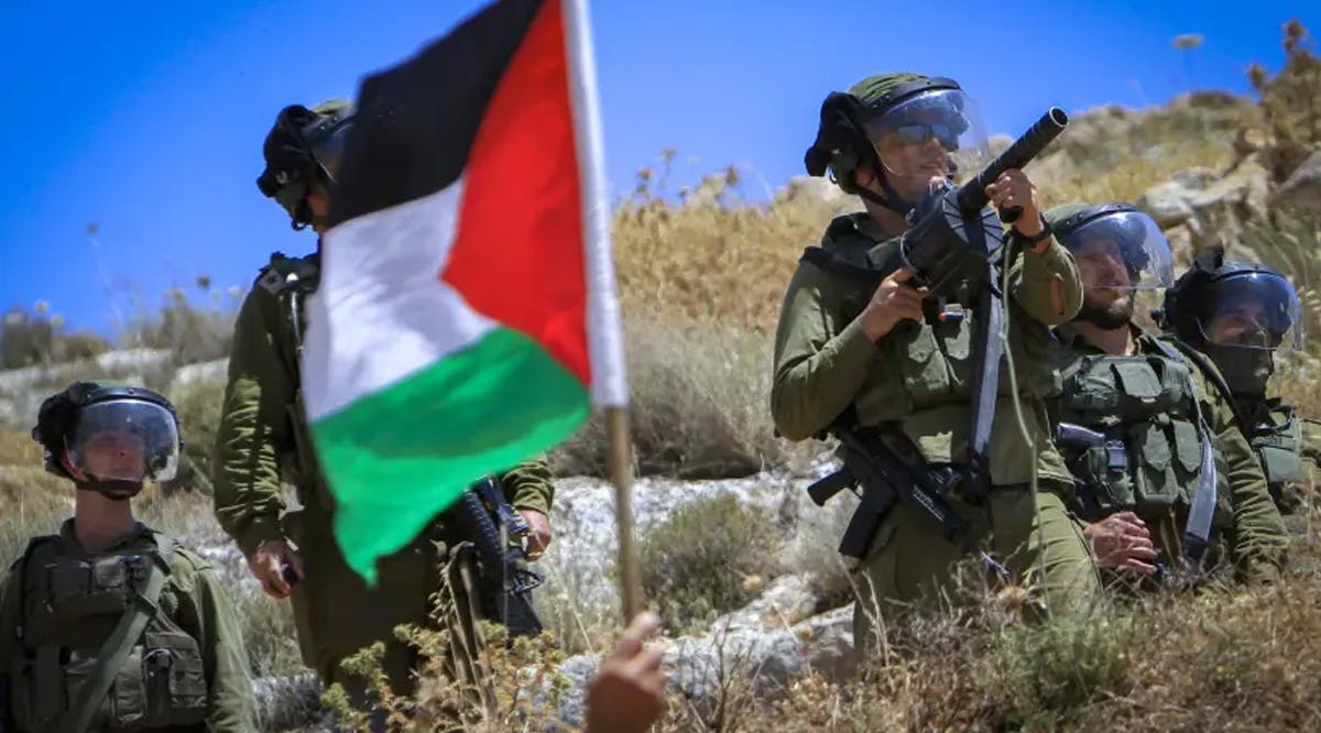 Palestinians clash with Israeli security forces during a protest in the village of Beit Dajan