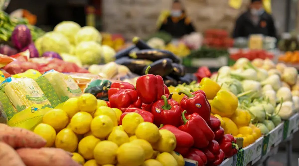 Fresh vegetables are sold at the shuk