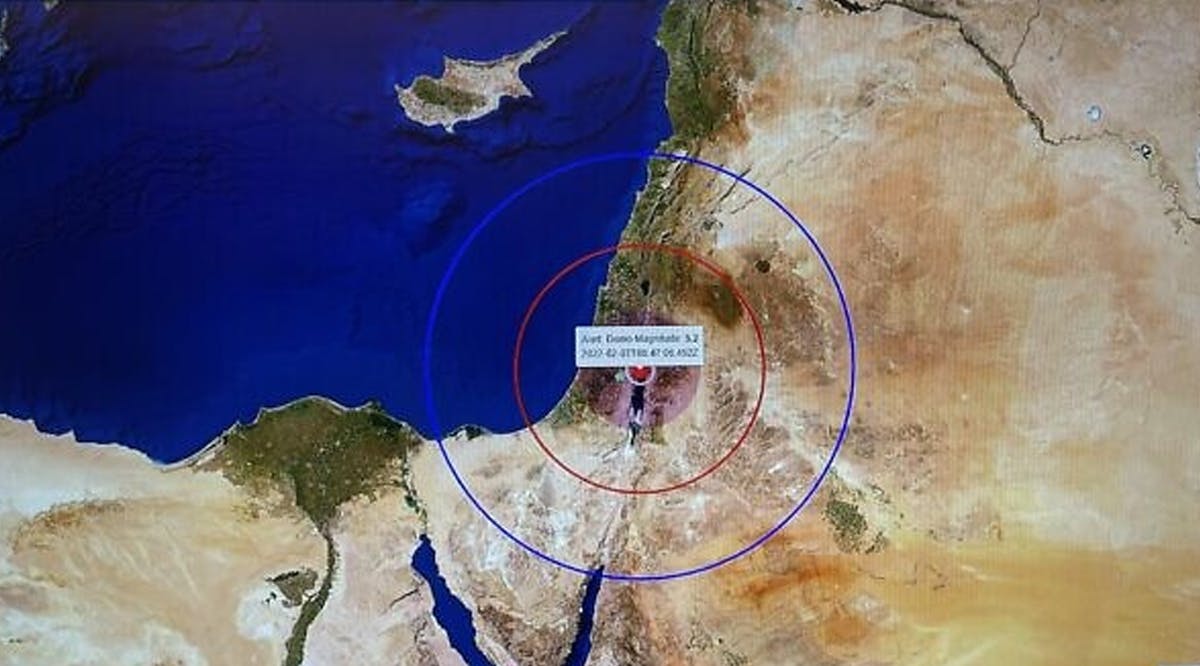 A screen in the situation room of the Israel Geological Survey in Jerusalem shows the epicenter of an earthquake