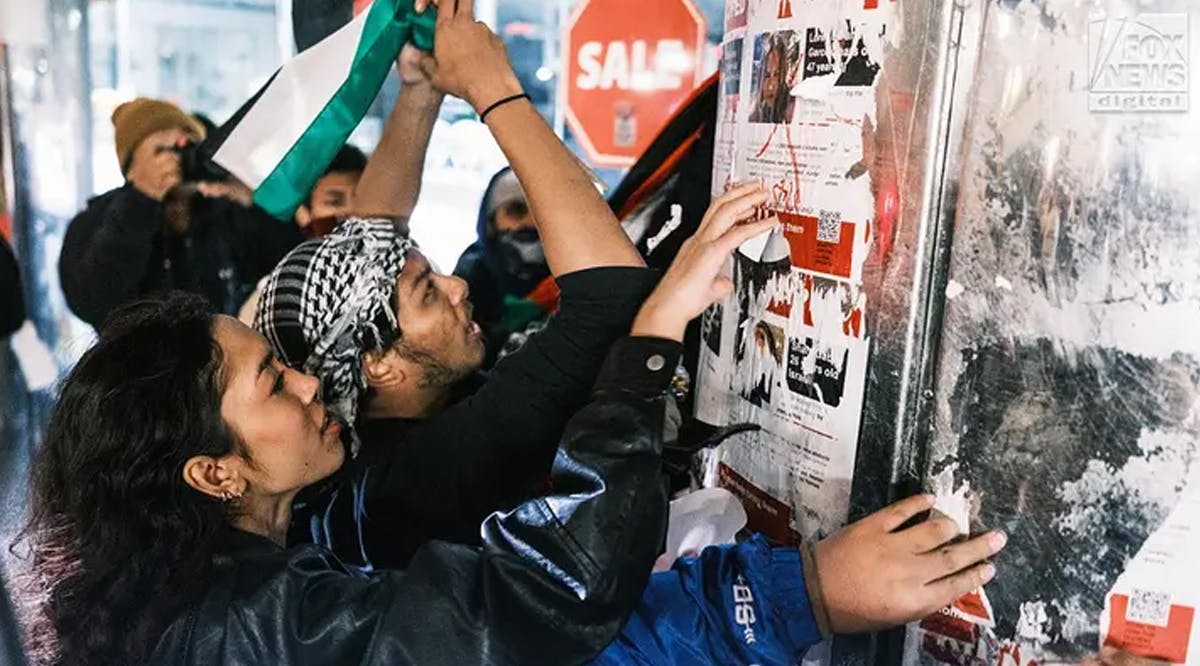 Pro-Palestinian protesters tear down posters of kidnapped Israelis in New York City