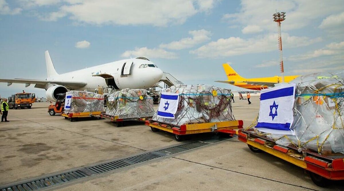 Equipment for an Israeli field hospital set to be built in the western Ukrainian city of Mostyska is loaded onto a plane at Ben Gurion Airport