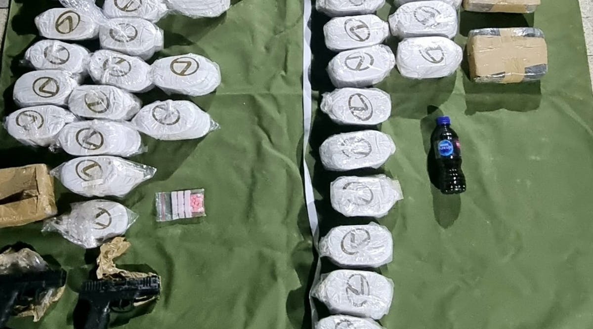 Drugs and handguns seized by Israeli troops following a smuggling attempt from Lebanon