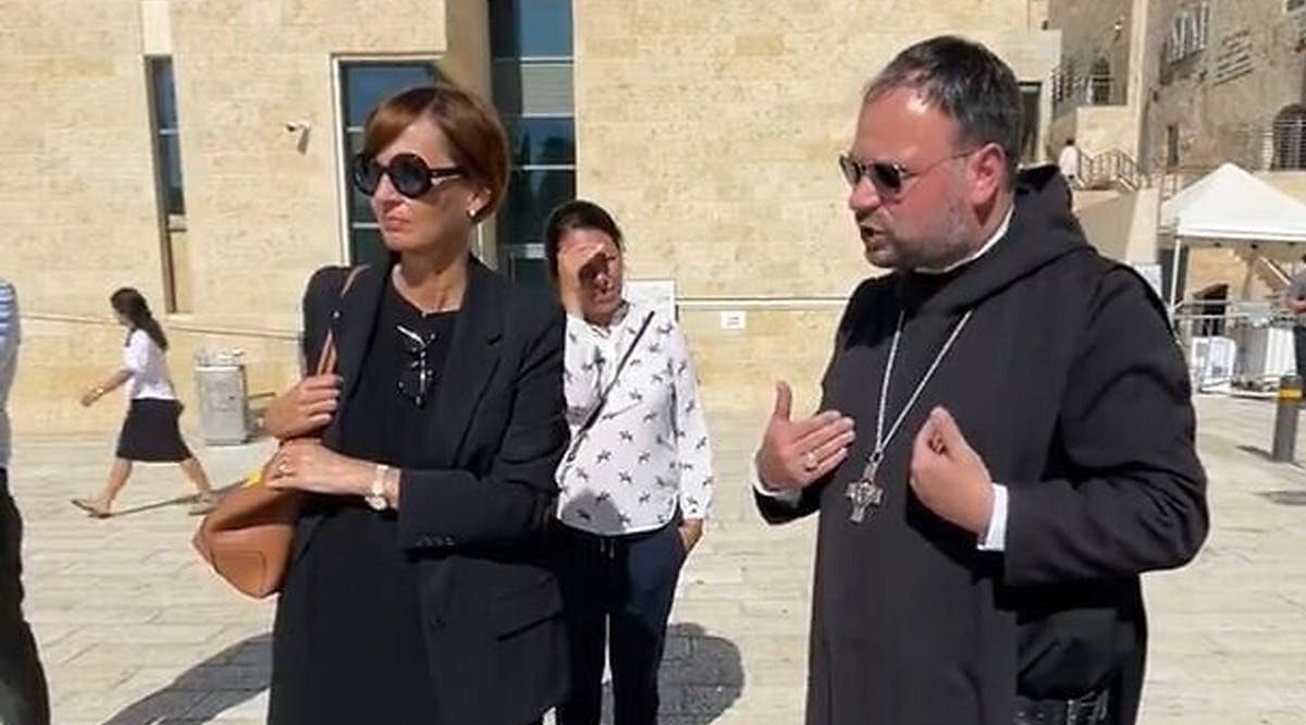 Abbot Nikodemus Schnabel, right, and Germany's Federal Minister of Education and Research Bettina Stark-Watzinger at the Western Wall plaza in Jerusalem