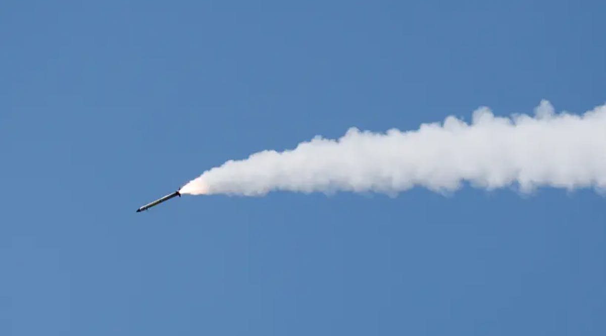 An Iron Dome anti-missile system fires an interceptor missile as a rocket is launched from the Gaza Strip towards Israel