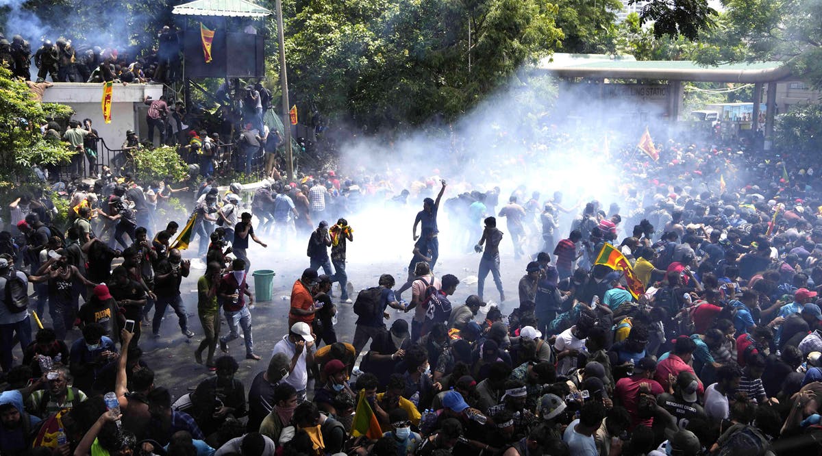 Police use tear gas to disperse the protesters who stormed the compound of Prime Minister Ranil Wickremesinghe’s office, amid economic crisis in Colombo, Sri Lanka