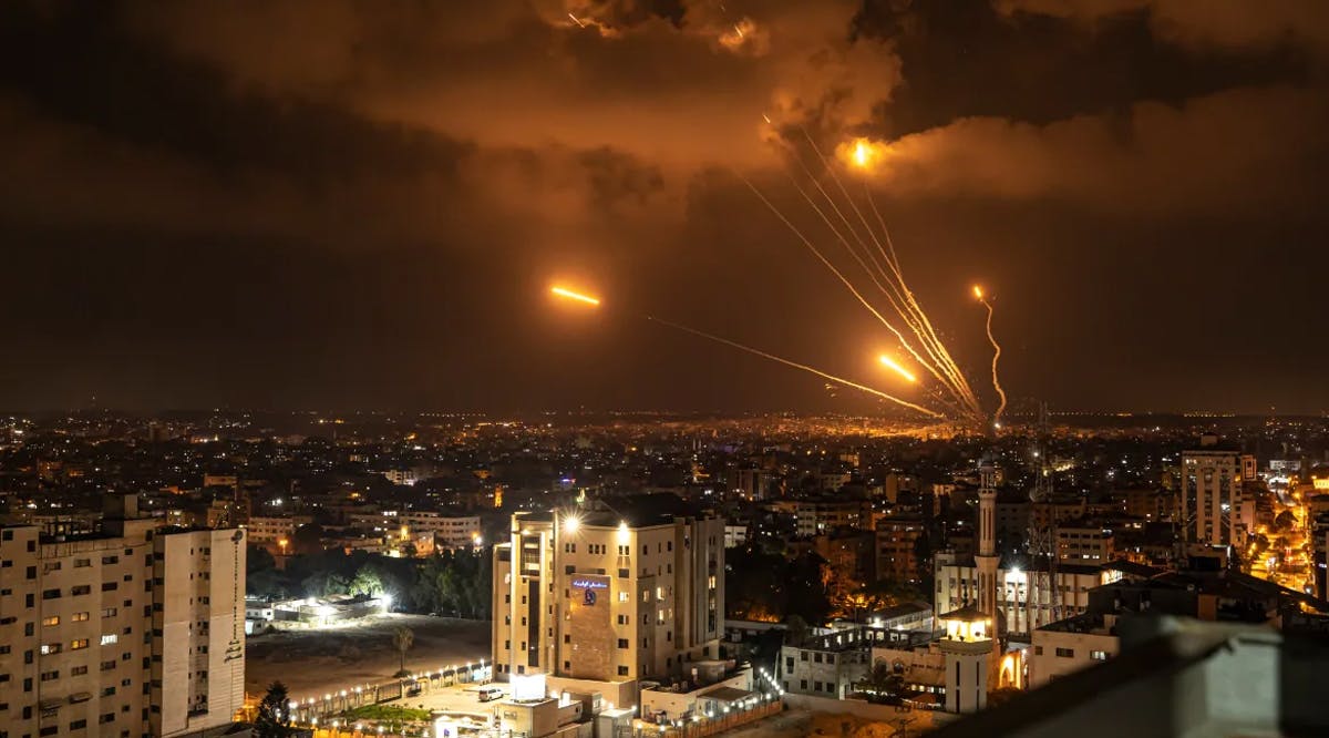 Rockets fired by Palestinian militants toward Israel are seen in Gaza City