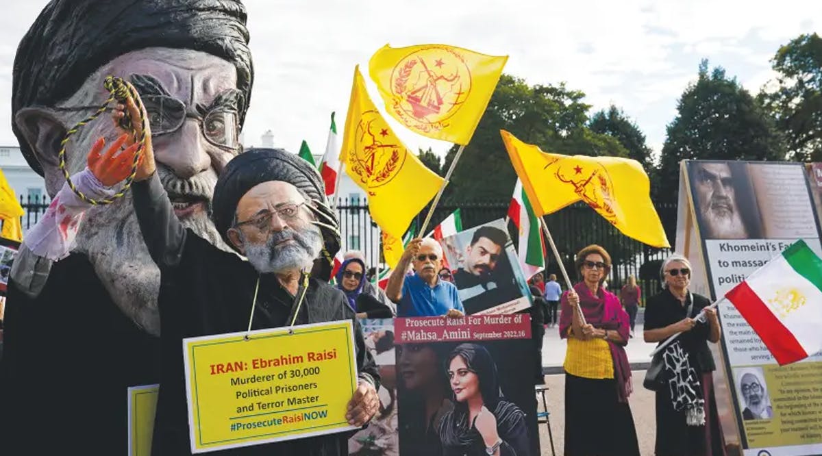 IRANIAN AMERICANS, including two people dressed up as Iranian Supreme Leader Ayatollah Ali Khamenei and President Ebrahim Raisi, rally outside the White House