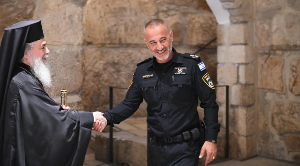 Jerusalem Police District chief Doron Turgeman speaks to local Christian community leaders