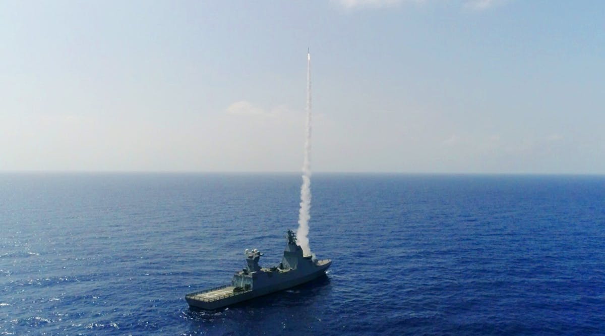 An Iron Dome missile defense system fires an interceptor from a Sa’ar-6 corvette