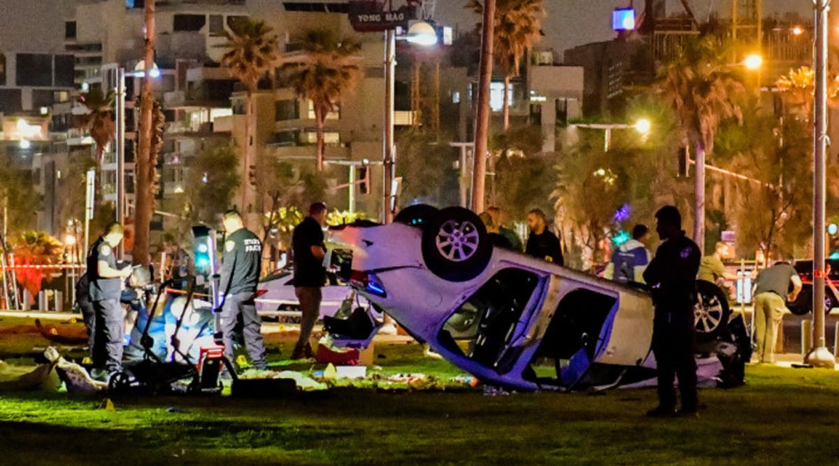 Police at the scene of a car-ramming attack in Tel Aviv