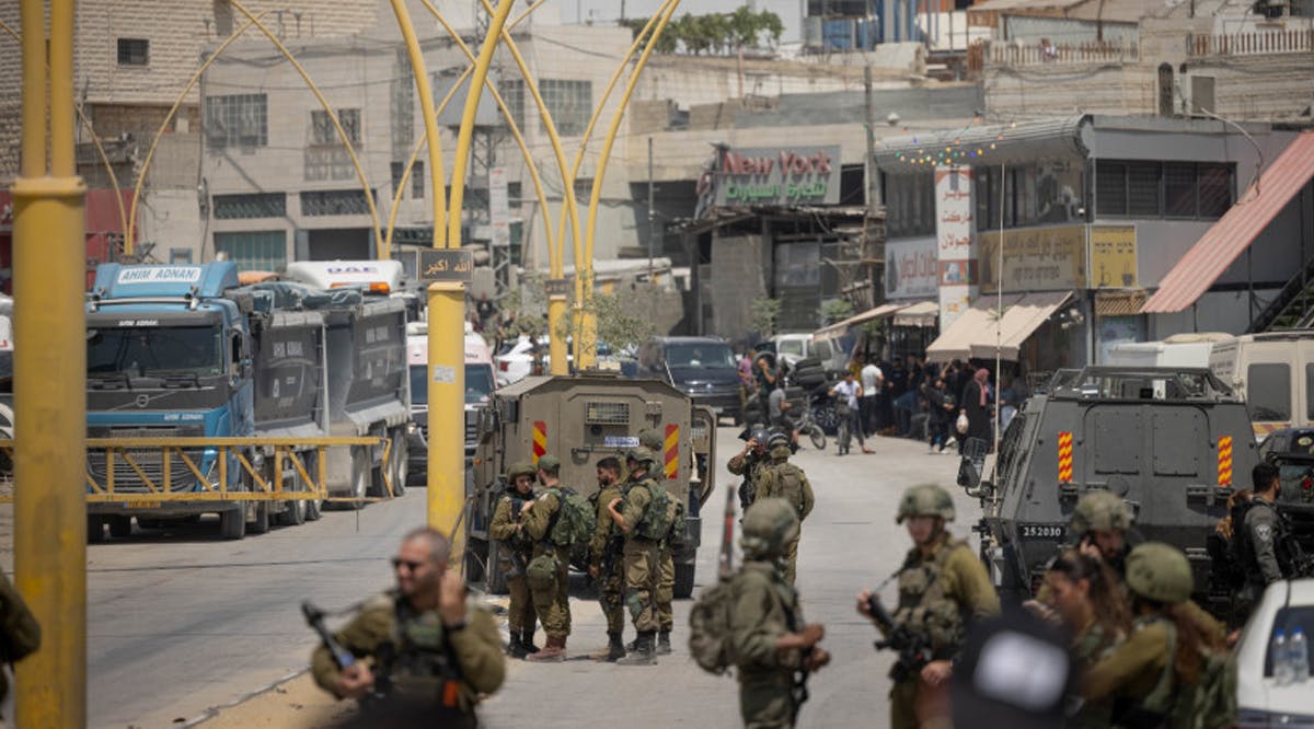 Israeli security forces seen at the entrance to the West Bank city of Hebron