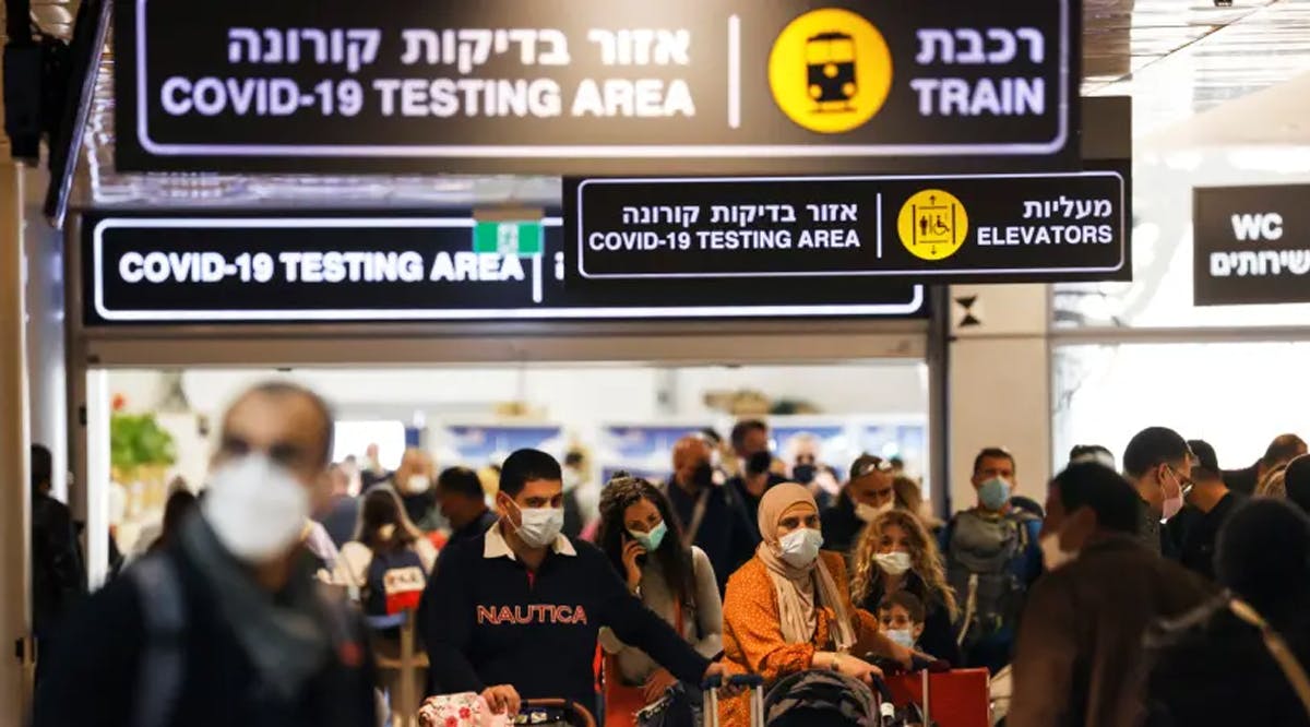 Travelers exit the coronavirus disease (COVID-19) pandemic testing area at Ben Gurion International Airport