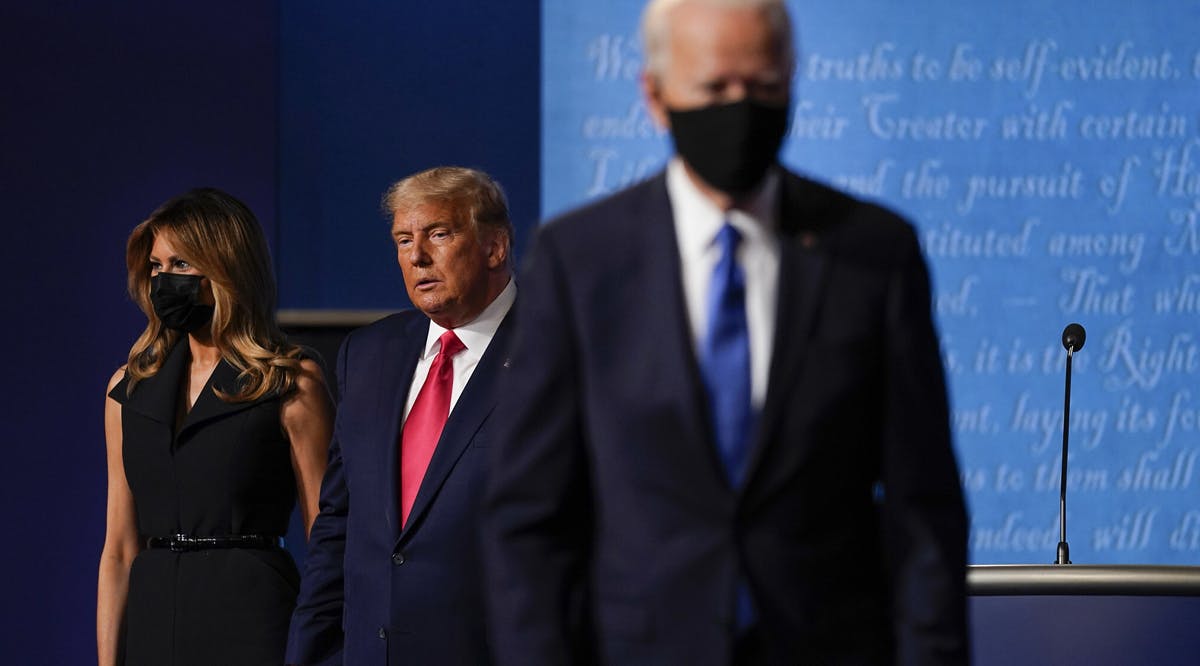 US First lady Melania Trump and US President Donald Trump, with Democratic presidential candidate former Vice President Joe Biden
