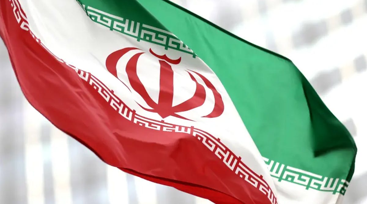 Iranian flag flies in front of the UN office building, housing IAEA headquarters