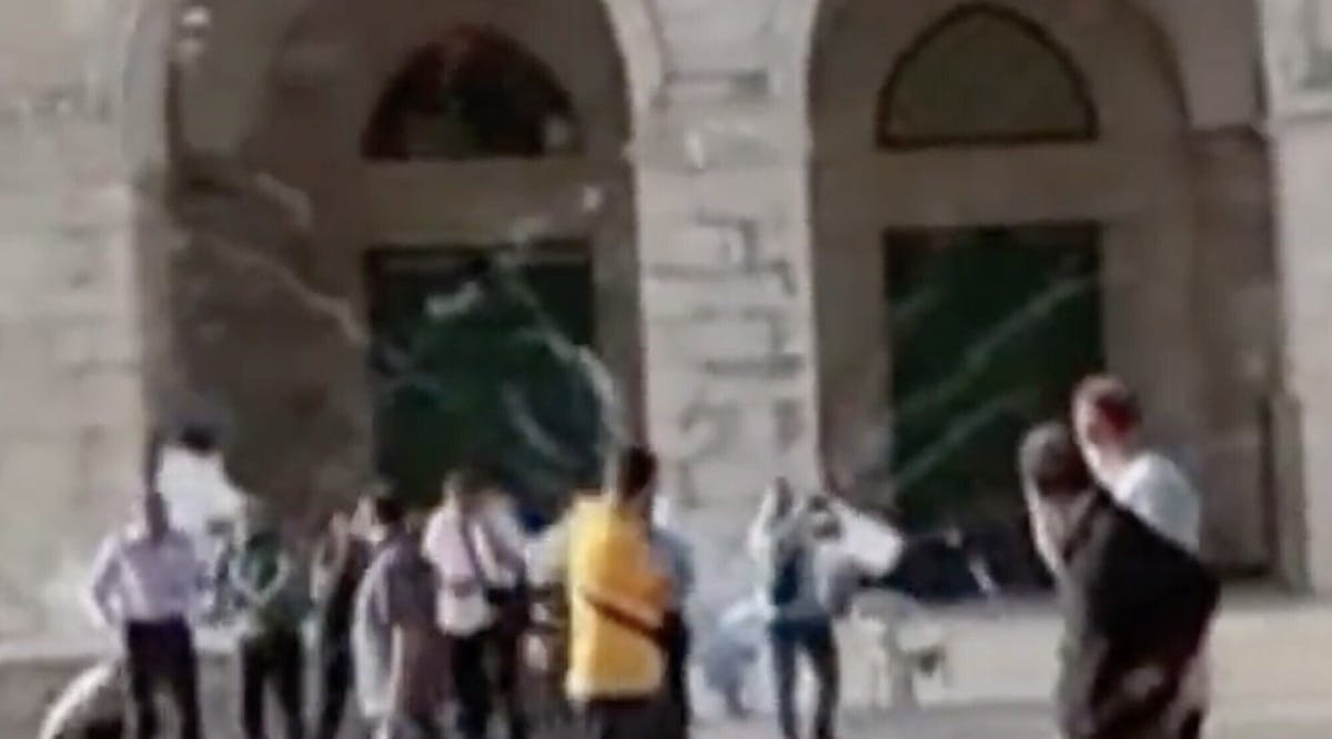 fireworks being shot off during scuffles between Palestinians and officers at the Temple Mount in Jerusalem's Old City