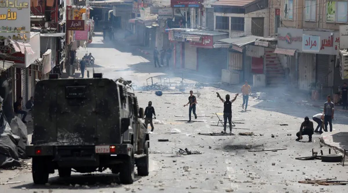 Palestinian militants clash with Palestinian security forces, in Nablus in the West Bank