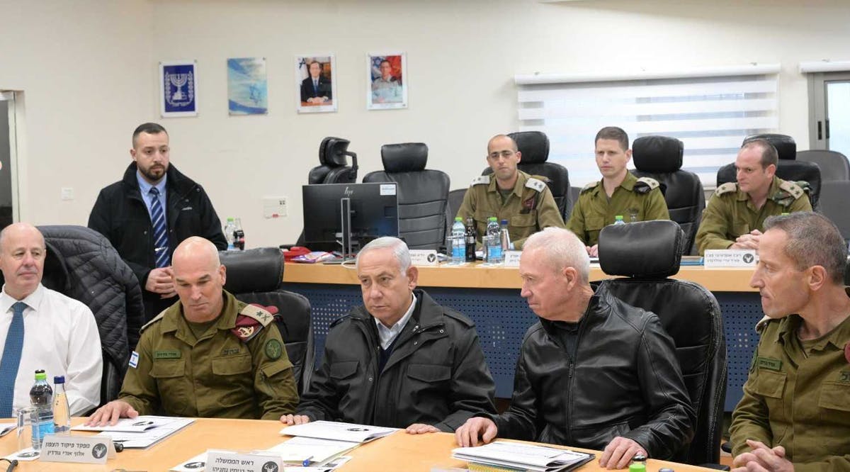 Prime Minister Benjamin Netanyahu (center) and Defense Minister Yoav Gallant (2nd right) during a visit to the military's Northern Command in Safed