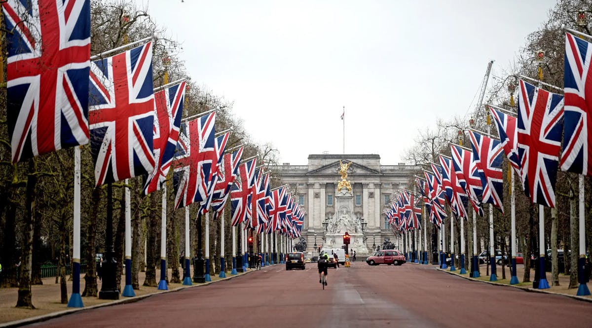 Union Jacks outside Buckingham Palace in London