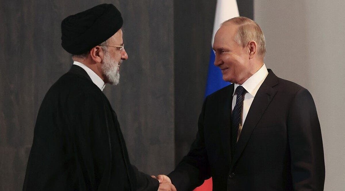 Russian President Vladimir Putin meets with his Iranian counterpart Ebrahim Raisi
