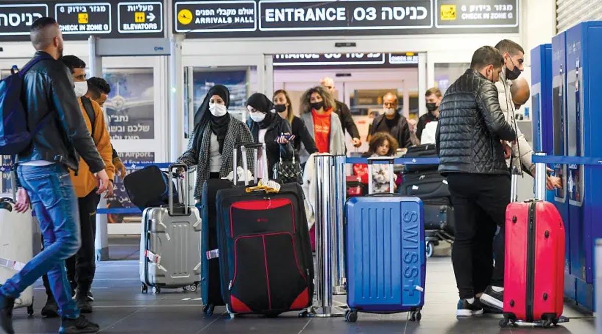 Travelers arriving at Ben-Gurion Airport
