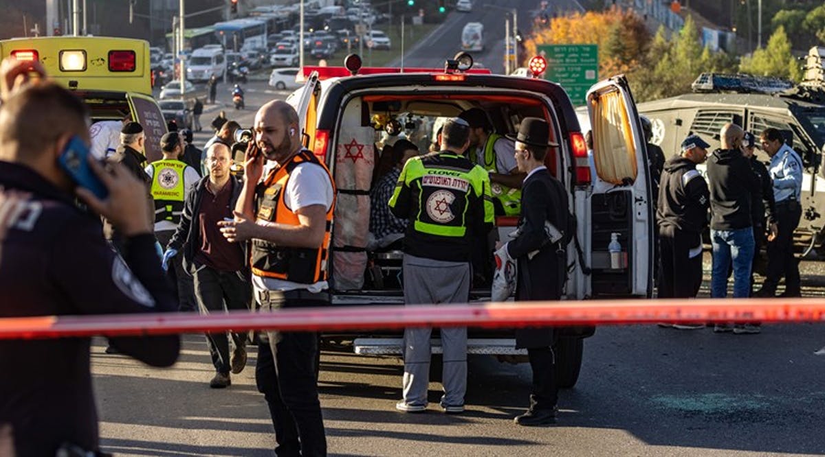 Police and security personnel at the scene of a Jerusalem bombing