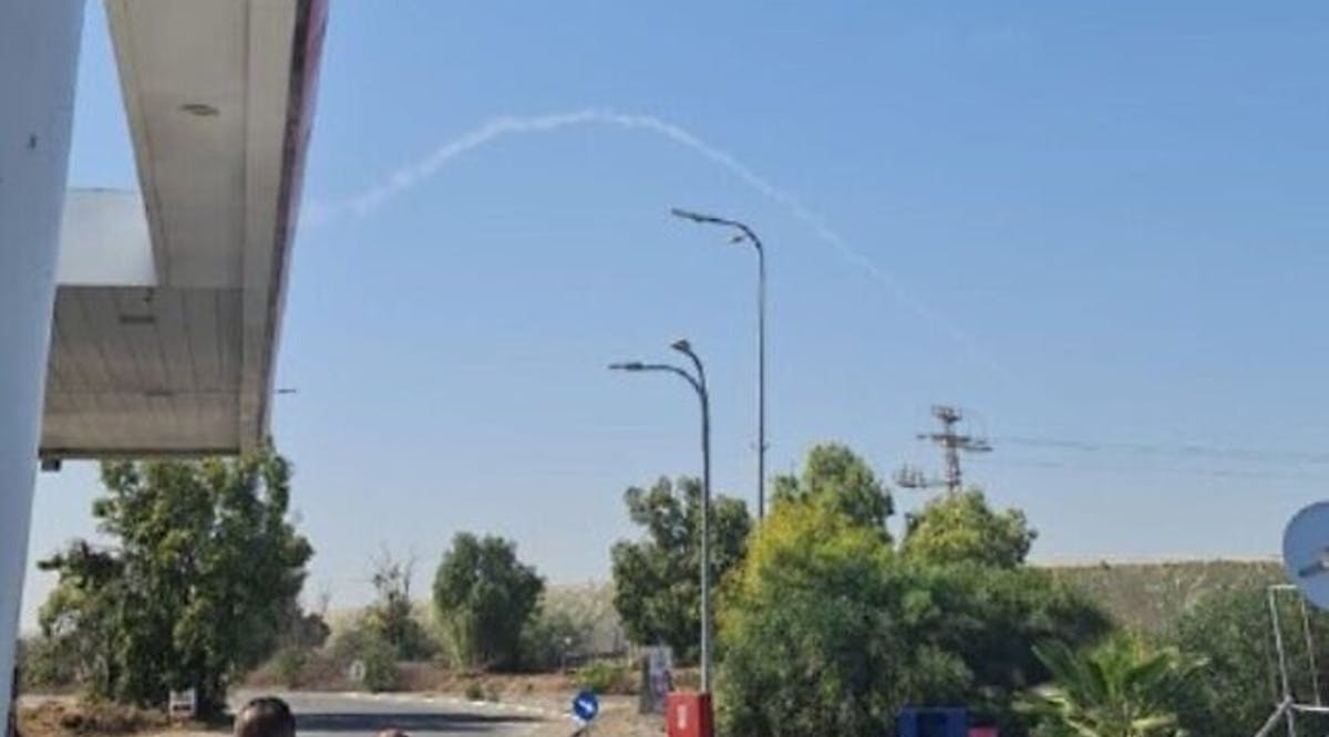 The trails of an Iron Dome interceptor missile are seen in the skies over southern Israel.