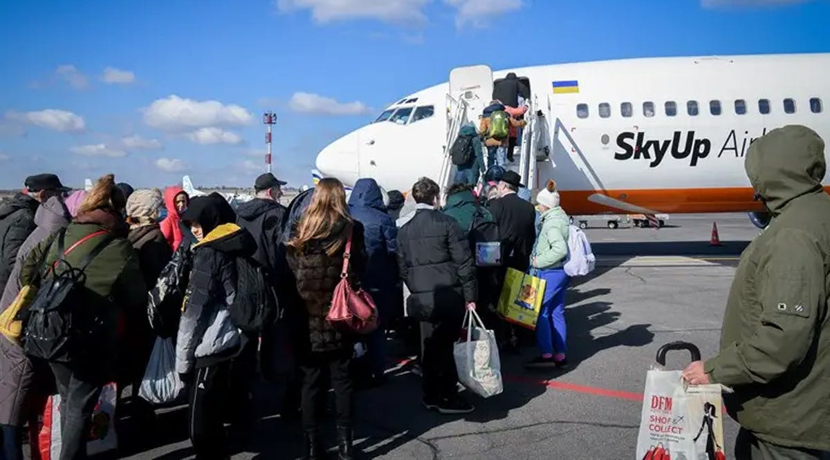 Immigrants bording a plane to Israel