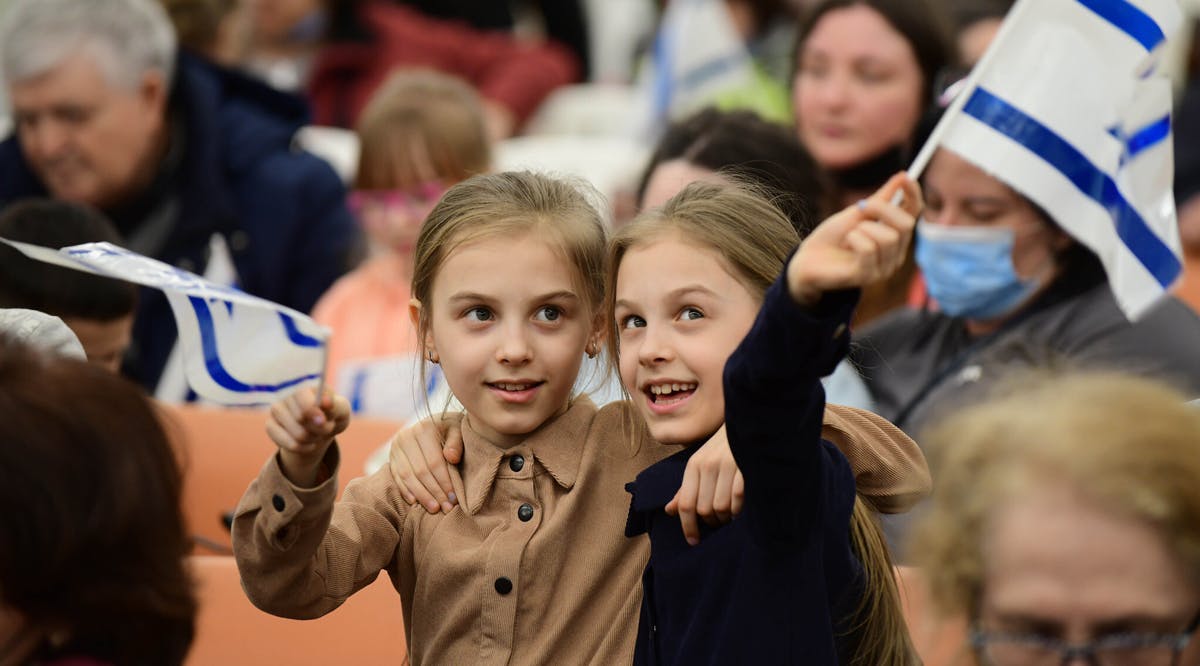 Jewish immigrants fleeing from war zones in Ukraine arrive at the Israeli immigration and absorption office at Ben Gurion Airport