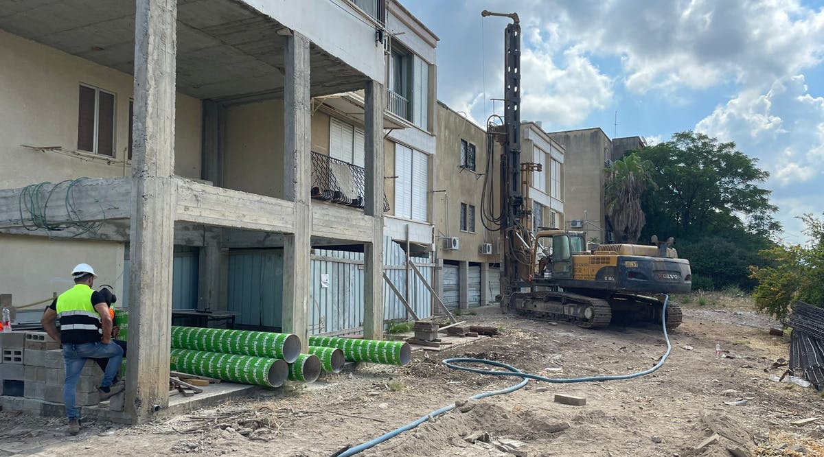 Defense Ministry and military engineers work to construct bomb shelters in homes in the northern town of Shlomi