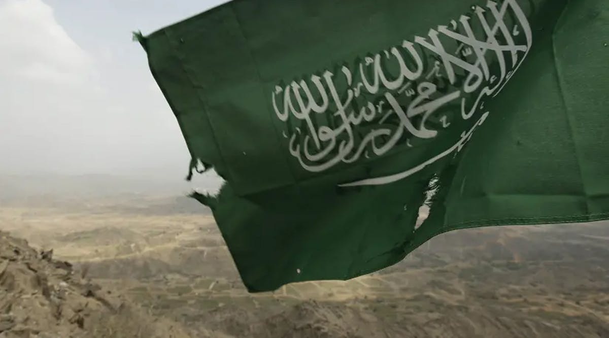 Saudi Arabia's national flag is seen at the Khoba frontline border with Yemen