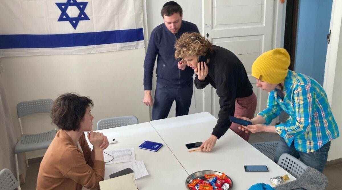 Volunteers work together at a Jewish community crisis center in Warsaw