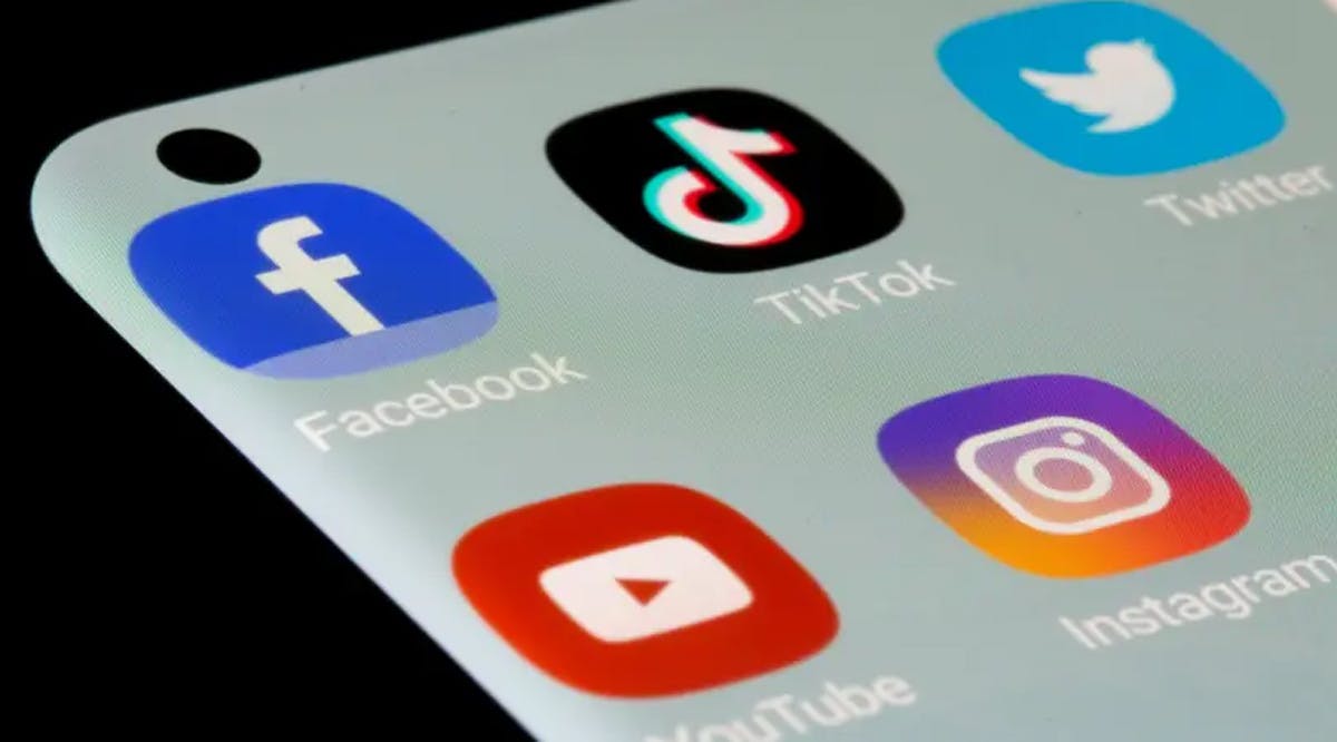 Facebook, TikTok, Twitter, YouTube and Instagram apps are seen on a smartphone