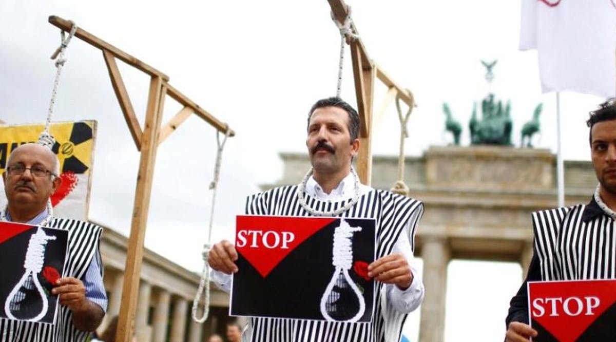 People stage a protest against the execution by Iran of up to 20 Kurds