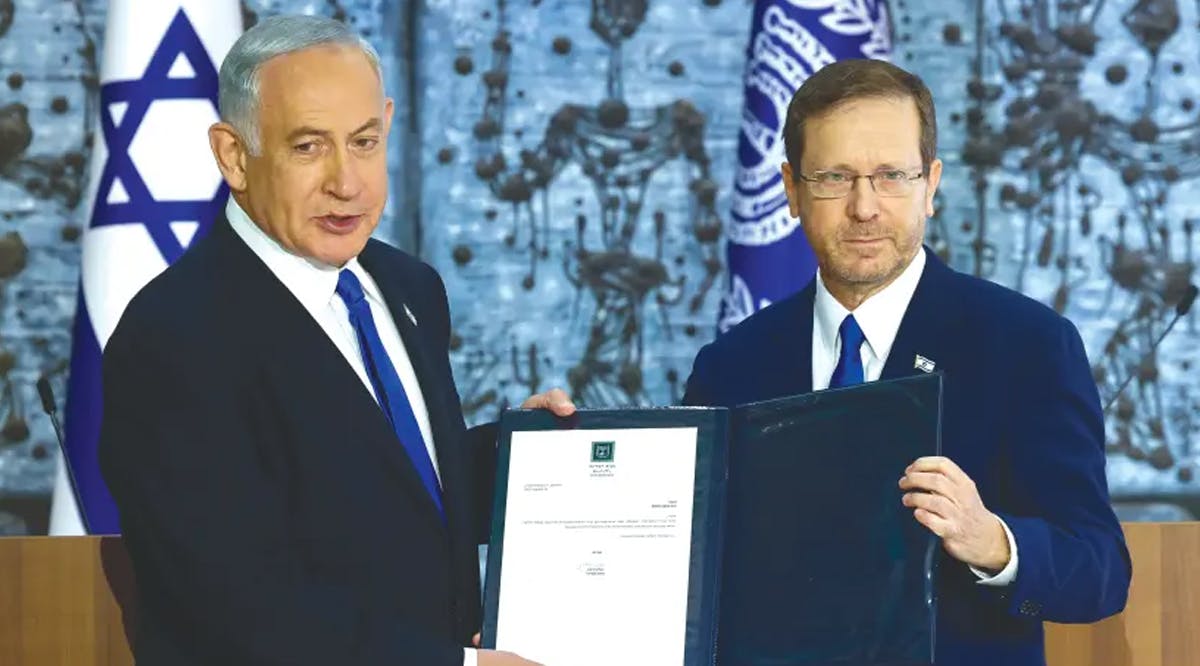 PRESIDENT ISAAC Herzog presents a letter to MK Benjamin Netanyahu, giving him a mandate to try to form a government coalition
