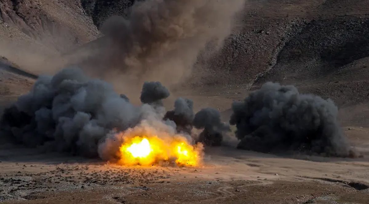 An explosion is seen during an Islamic Revolutionary Guard Corps (IRGC) ground forces military drill in the Aras area, East Azerbaijan province, Iran