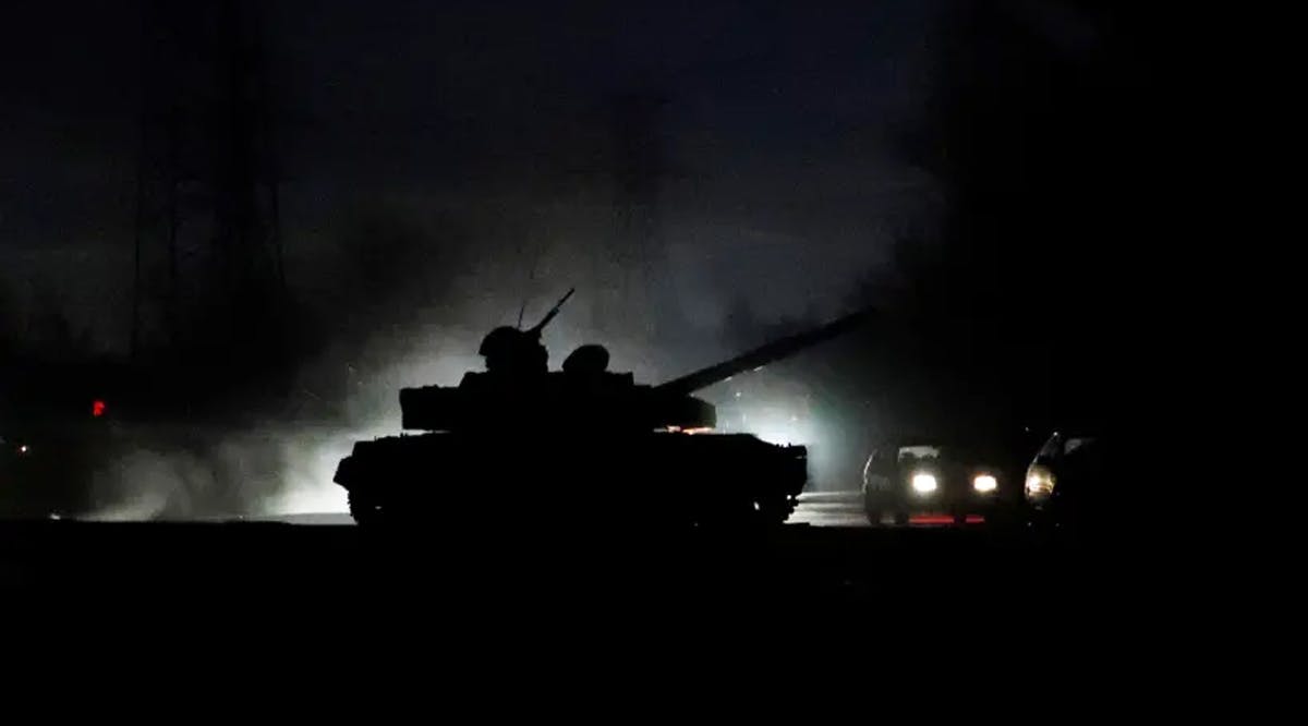 A tank drives along a street in eastern Ukraine