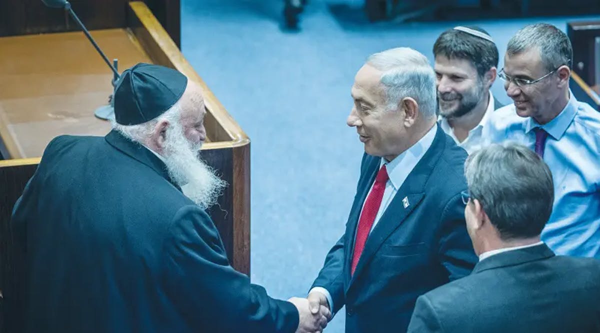 LIKUD LEADER BENJAMIN Netanyahu shakes hands with United Torah Judaism MK Yitzhak Goldknopf in the Knesset last week