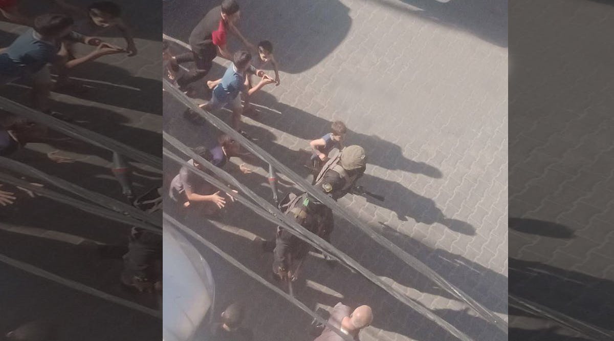 Hamas operatives surrounding themselves with children to prevent the IDF from firing at them
