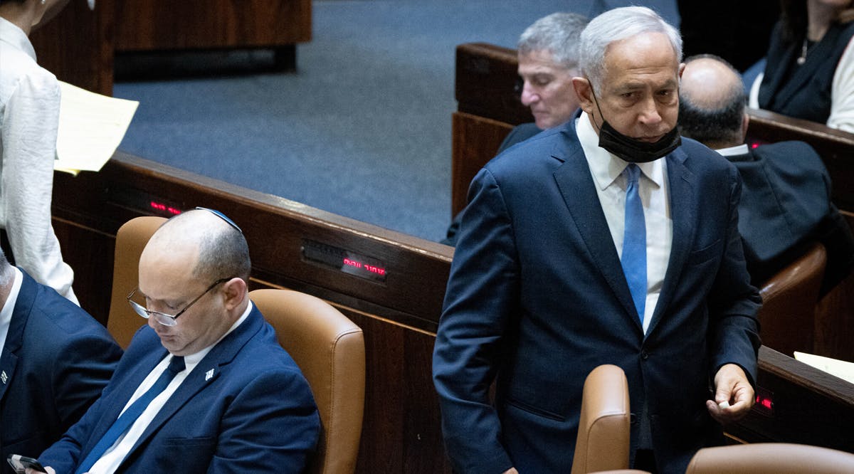 Likud party leader Benjamin Netanyahu walks next to Prime Minister Naftali Bennett
