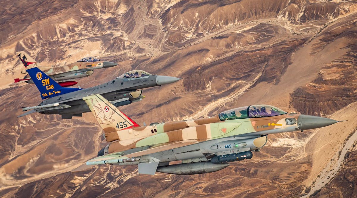 Two Israeli and one American F-16 fighter jets fly alongside one another during a joint exercise in southern Israel