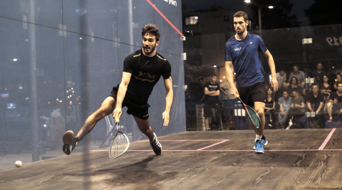 A pair of competitors take part in the professional squash tournament